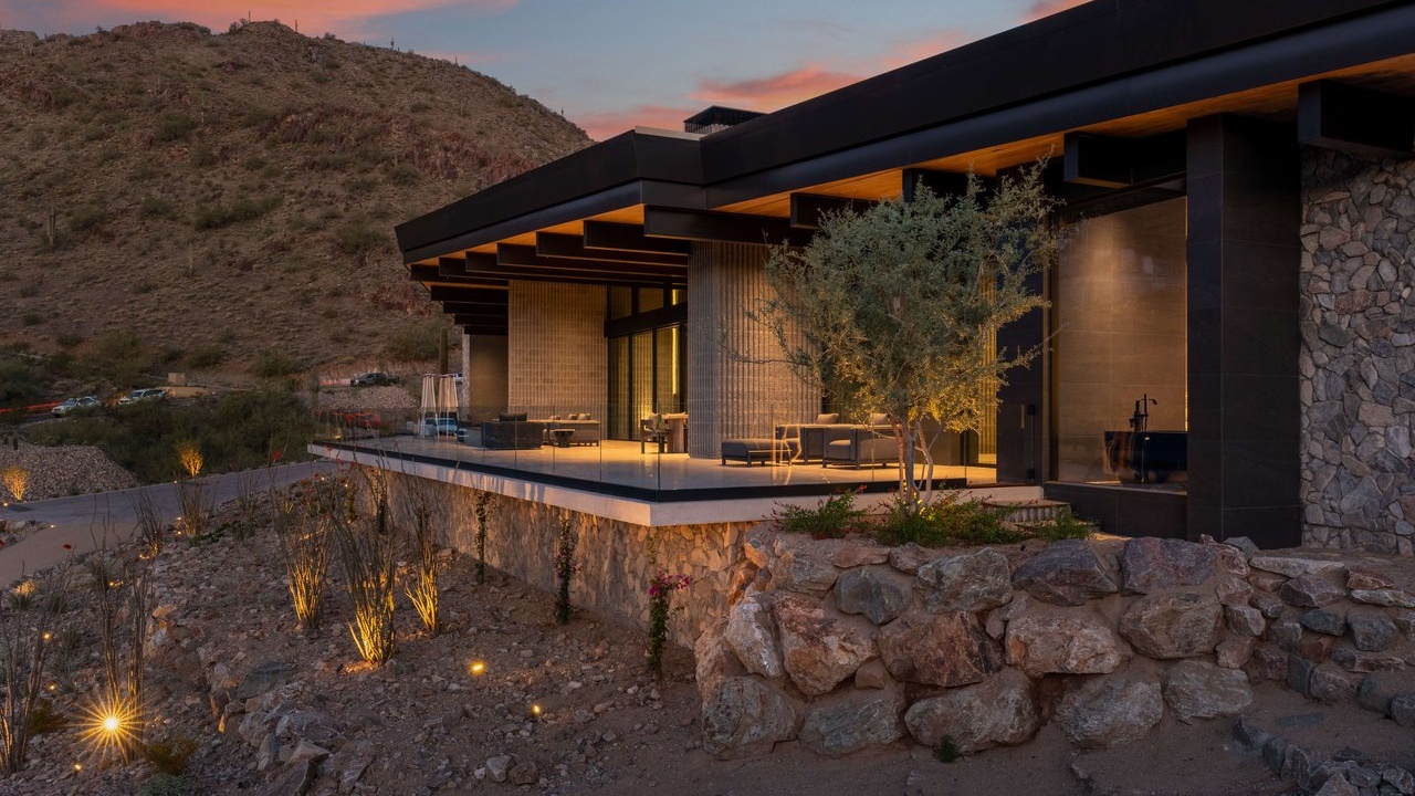 Contemporary Arizona hillside home at dusk